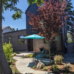 a patio with a table and umbrella a patio with a table and umbrella