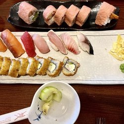 Two rolls (don't remember names), sushi variety w/side of ginger & wasabi & what's left of the amazing marinated cucumbers!