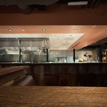 Rooster's Wood-fired Kitchen Uptown - Open kitchen - New American Near Me - Charlotte, North Carolina Rooster's Wood-fired Kitchen Uptown - Open kitchen - New American Near Me - Charlotte, North Carolina