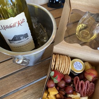 Mitchell Katz Winery - Charcuterie board box and bottle of Chardonnay - Wineries Near Me - Livermore, California Mitchell Katz Winery - Charcuterie board box and bottle of Chardonnay - Wineries Near Me - Livermore, California