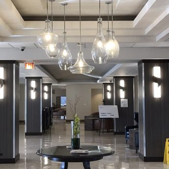 Longstreet Electric - Hanging 7 independent light fixture 20 sconces on Sheraton Hotel in Elk Grove Village - Electricians Near Me - Schaumburg, Illinois Longstreet Electric - Hanging 7 independent light fixture 20 sconces on Sheraton Hotel in Elk Grove Village - Electricians Near Me - Schaumburg, Illinois