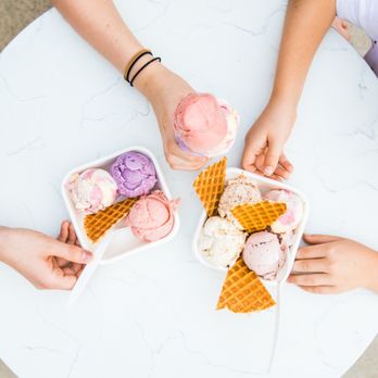 Jeni's Splendid Ice Creams - three people holding ice cream cones - Ice Cream & Frozen Yogurt Near Me - Columbus, Ohio Jeni's Splendid Ice Creams - three people holding ice cream cones - Ice Cream & Frozen Yogurt Near Me - Columbus, Ohio