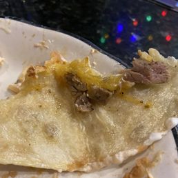 Steak QUESADILLA the plastic cup had the sour cream and tomato Steak QUESADILLA the plastic cup had the sour cream and tomato