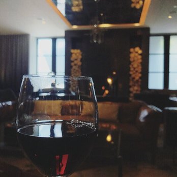 Hotel Van Zandt - Wine hour by the gorgeous fireplace. - Hotels Near Me - Austin, Texas Hotel Van Zandt - Wine hour by the gorgeous fireplace. - Hotels Near Me - Austin, Texas