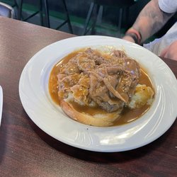 Thirsty Turtle Bar and Grill - Open Beef Sandwich on mashed potatoes and bread, covered in gravy.