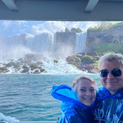 Legacy Tour & Travel - Some travelers cruising on the Maid of the Mist at Niagara Falls on our New England Fall Foliage trip!