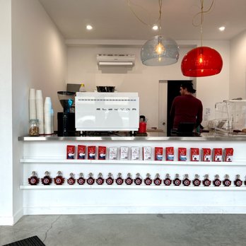 Coffee House - a woman standing at the counter - Coffee & Tea Near Me - Toronto, Ontario Coffee House - a woman standing at the counter - Coffee & Tea Near Me - Toronto, Ontario