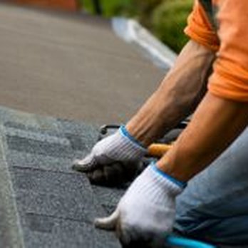 Acclaim Renovations - a man working on a roof - Roofing Near Me Acclaim Renovations - a man working on a roof - Roofing Near Me