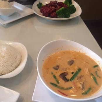Sun Cuisines - Top: sesame chicken. Bottom: soup consistency panang curry. 4/5 - Thai Near Me - Buffalo, New York Sun Cuisines - Top: sesame chicken. Bottom: soup consistency panang curry. 4/5 - Thai Near Me - Buffalo, New York