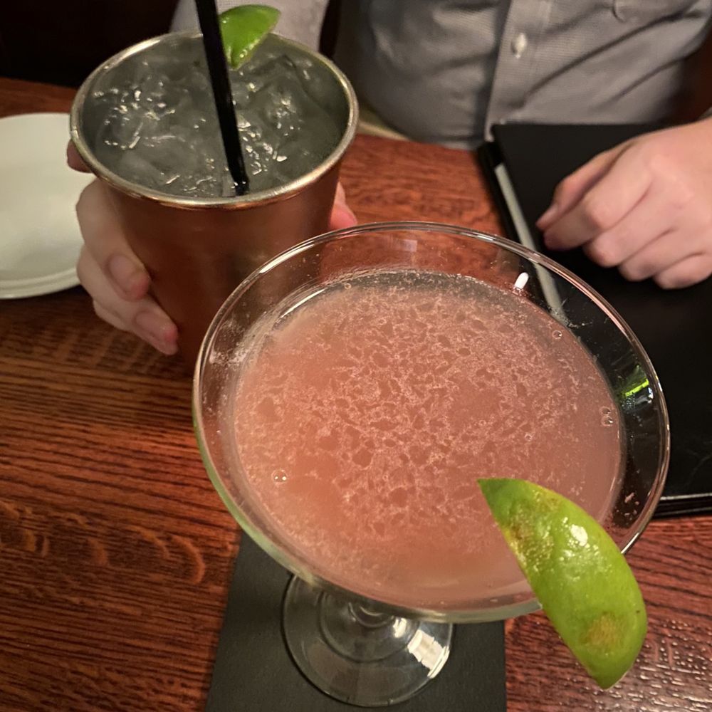 a close up of two cocktails a close up of two cocktails