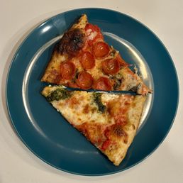Pepperoni and Pesto pizzas. So delicious! Pepperoni and Pesto pizzas. So delicious!