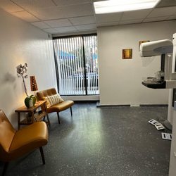 Western Diagnostic Imaging Center - Picture of mammography room with the mammography machine and chairs