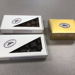 Dark chocolate coconut cream peanut butter cups and milk chocolate pecan