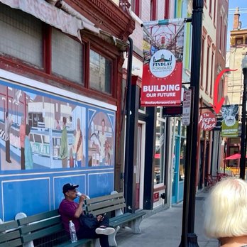 Eli's BBQ - Findlay - Eli's is the brick-red storefront one-door in from Elm Street on Elder south of Findlay Market. See the pig? (Not my best photo...) - Barbeque Near Me - Cincinnati, Ohio