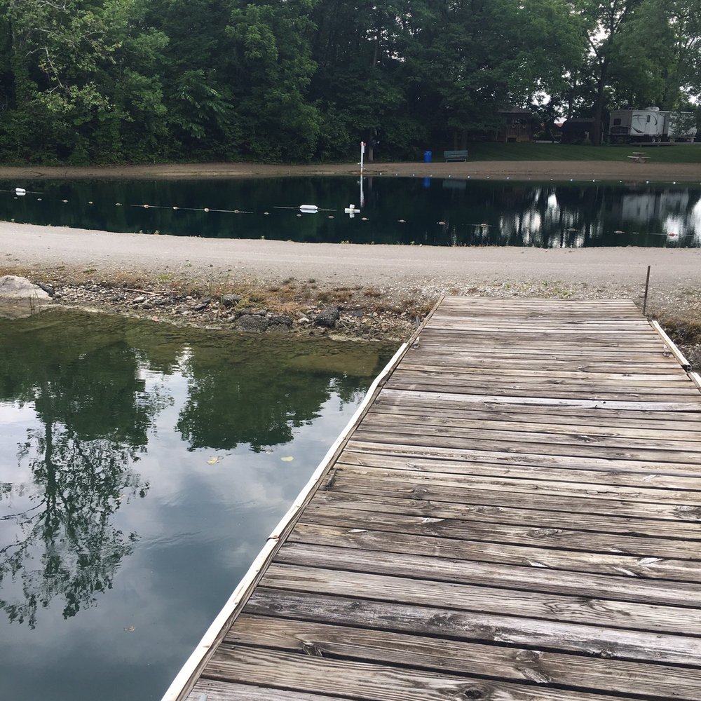Hidden Lakes Resort - Dock on the fishing pond looking back at the small swimming pond. - Campgrounds Near Me - Fairmount, Indiana Hidden Lakes Resort - Dock on the fishing pond looking back at the small swimming pond. - Campgrounds Near Me - Fairmount, Indiana