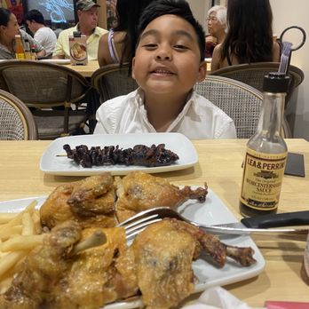 Max's Restaurant - he loves the pork bbq skewers - Filipino Near Me - Bakersfield, California Max's Restaurant - he loves the pork bbq skewers - Filipino Near Me - Bakersfield, California