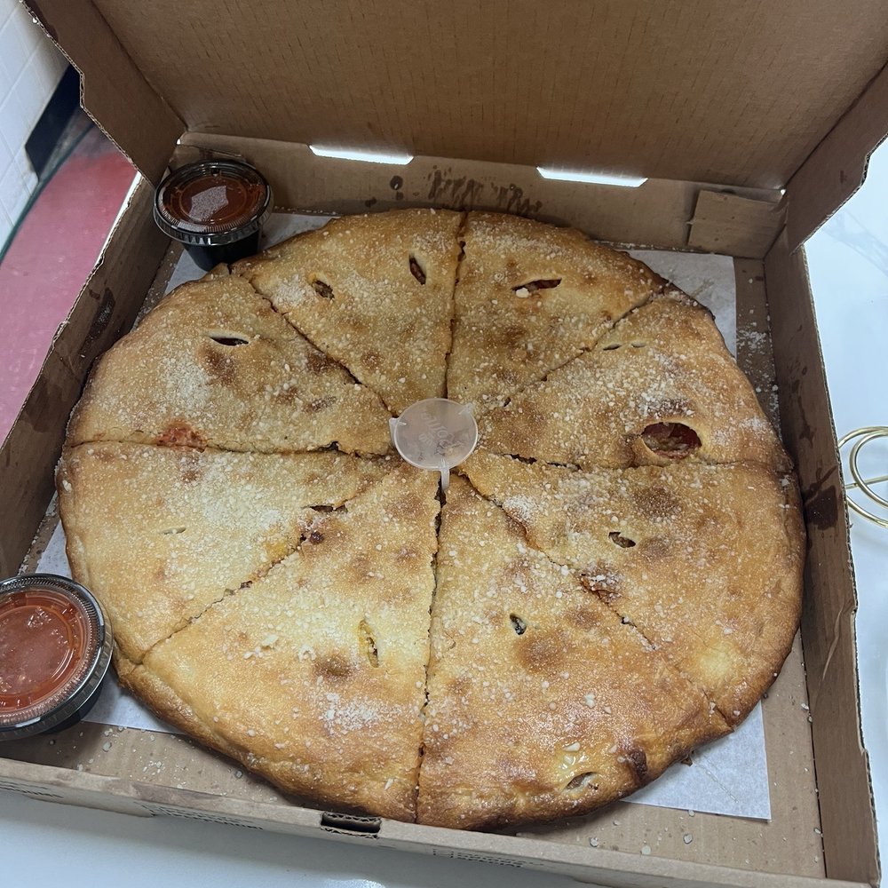 Dominick Pizzeria - Supreme calzone pizza - Pizza Near Me - Naples, Florida