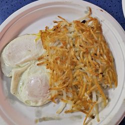 Strikes & Spares Grill - Eggs over medium y hashbrowns part of the chicken fried steak plate