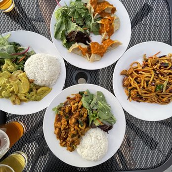 High Camp Taphouse - four plates of food on a table - Himalayan/Nepalese Near Me - Sisters, Oregon