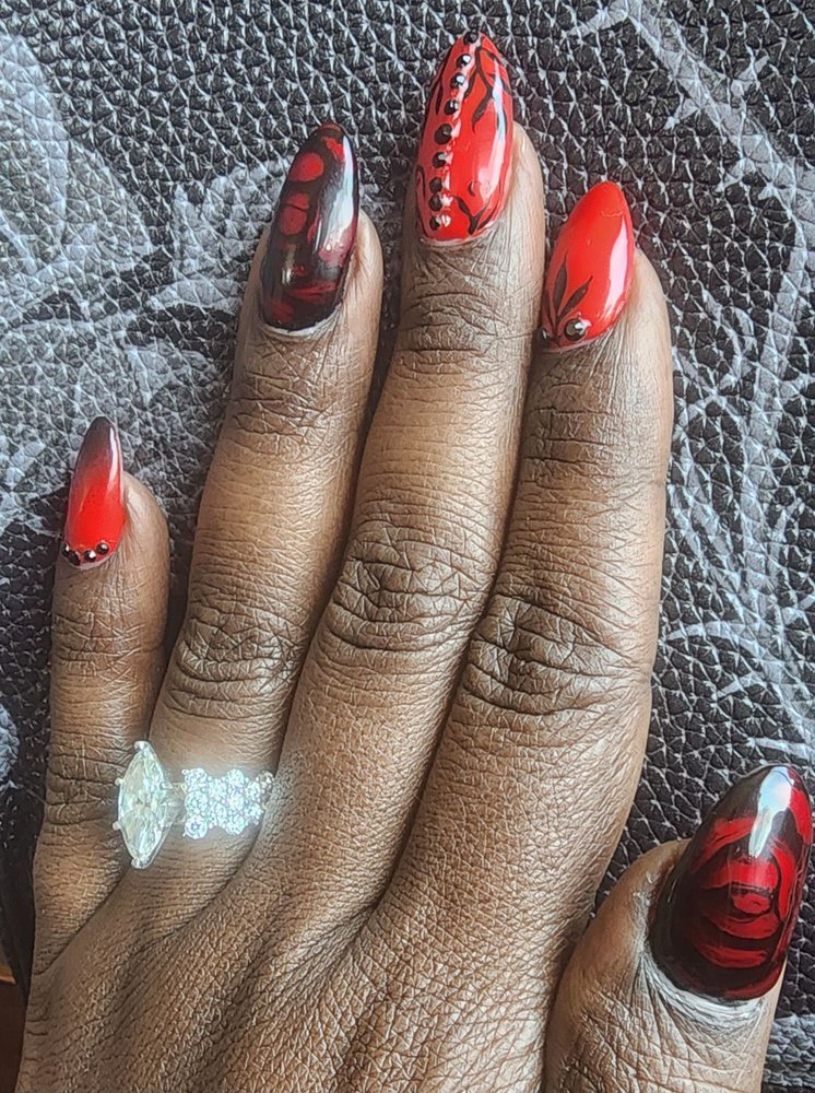 Cosmopolitan Nails Logo