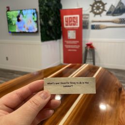 a hand holding a business card a hand holding a business card