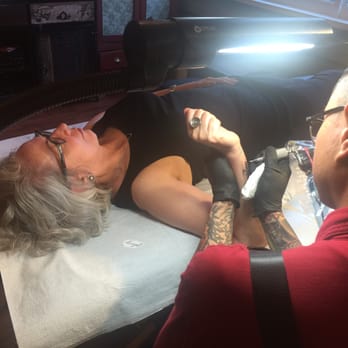 Tsunami Tattoo - Phuc Tran of Tsunami Tattoo at work. - Tattoo Near Me - Portland, Maine Tsunami Tattoo - Phuc Tran of Tsunami Tattoo at work. - Tattoo Near Me - Portland, Maine