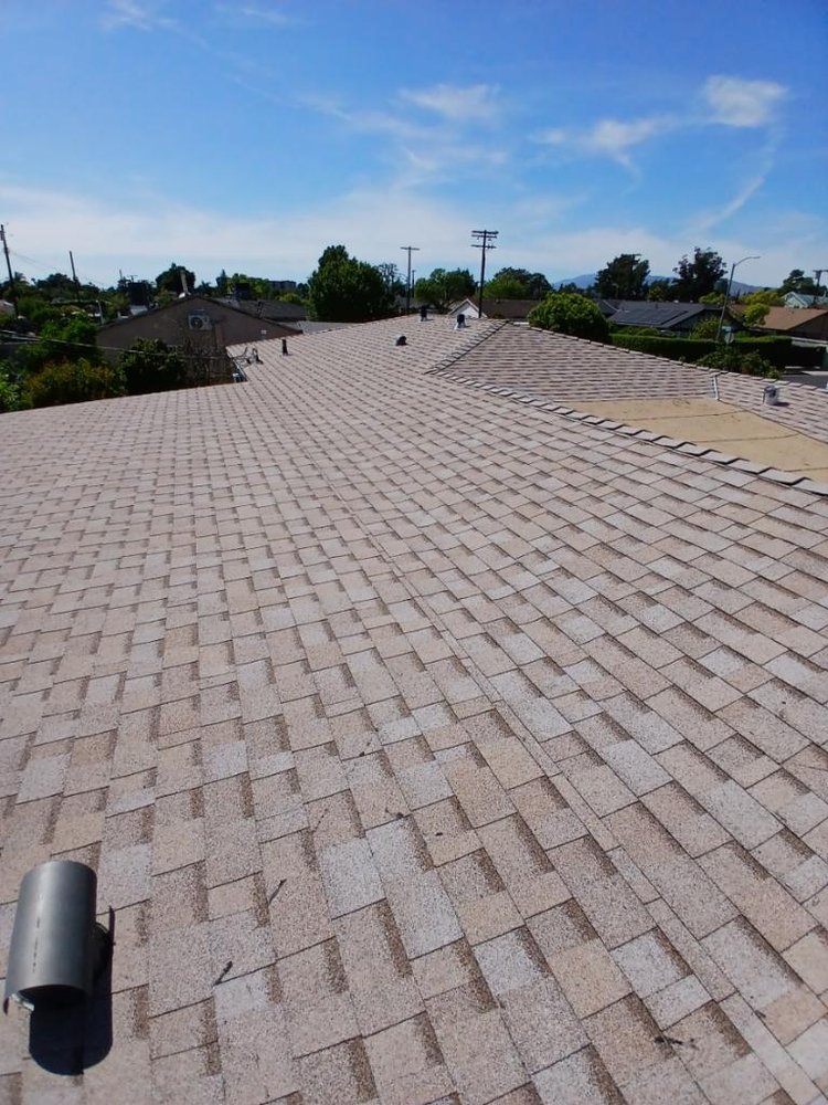 Slide of Reliance Roofing