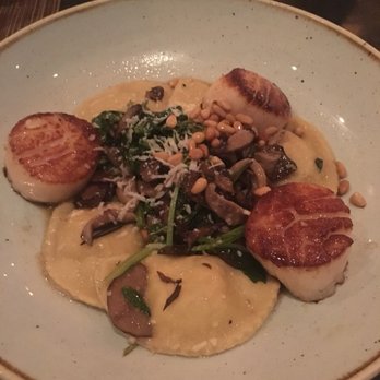 Aria - Homemade ricotta ravioli with scallops - Italian Near Me - Charlotte, North Carolina Aria - Homemade ricotta ravioli with scallops - Italian Near Me - Charlotte, North Carolina