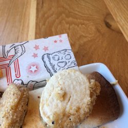 Pizza Hut - Vegan chicken nugget inside. Good texture.