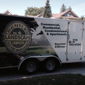 Bentley Landscaping - a trailer parked on the side of the road - Landscaping Near Me - London, Ontario Bentley Landscaping - a trailer parked on the side of the road - Landscaping Near Me - London, Ontario