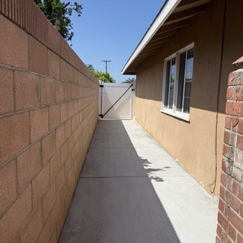 Resolve Landscape - Concrete floor, block wall, vinyl gate. - Landscaping Near Me
