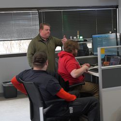 STACK Cybersecurity - STACK Cybersecurity staff collaborating on a technical issue