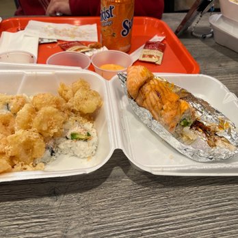 Sushi N Go - Popcorn Shrimp Roll on the left and baked salmon roll the right - Sushi Bars Near Me - Norwalk, California