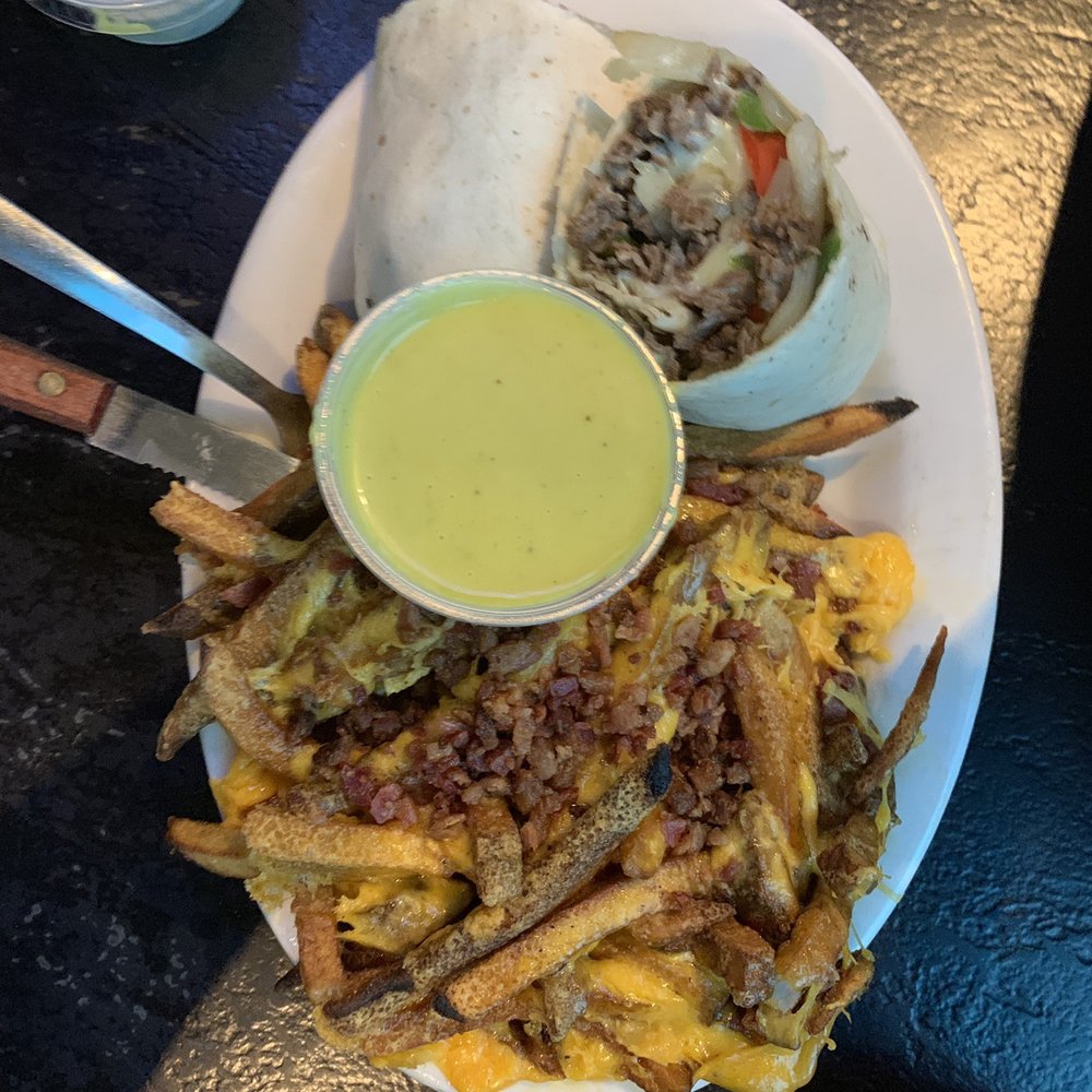 Brook Restaurant & Bar - Philly wrap with bacon/cheese fried-- up charge well worth it. - American Near Me - Tulsa, Oklahoma Brook Restaurant & Bar - Philly wrap with bacon/cheese fried-- up charge well worth it. - American Near Me - Tulsa, Oklahoma