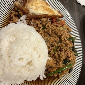 Thai Eatery - Ga-prow-rad-khao. Thai style basil ground chicken stir fry - Thai Near Me - Erie, Pennsylvania Thai Eatery - Ga-prow-rad-khao. Thai style basil ground chicken stir fry - Thai Near Me - Erie, Pennsylvania