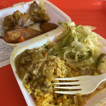 Golden Krust Caribbean Restaurant - Lunch special. All comes in this small box. Chicken curry, slaw rice and plantains - Caribbean Near Me - Raleigh, North Carolina Golden Krust Caribbean Restaurant - Lunch special. All comes in this small box. Chicken curry, slaw rice and plantains - Caribbean Near Me - Raleigh, North Carolina