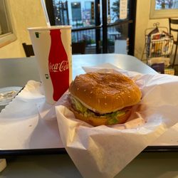 Sunny Grill - Fish Sandwich with avocado and Swiss cheese a a thick and creamy Pineapple milkshake