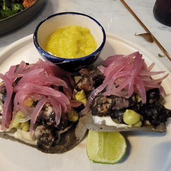 Balta - Octopus Tostadas with Black Recaudo, Alioli, Creamy Avocado, and Pickled Onion - Restaurants Near Me - México, D.F., DIF Balta - Octopus Tostadas with Black Recaudo, Alioli, Creamy Avocado, and Pickled Onion - Restaurants Near Me - México, D.F., DIF