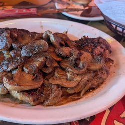 Texas Roadhouse - T-bone steak with mushrooms and onion