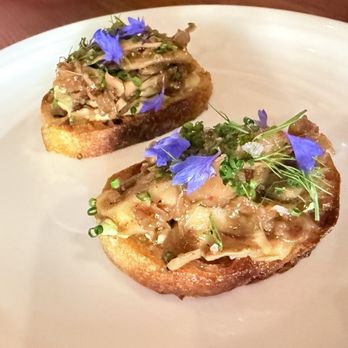 Bad Animal - Small bite appetizer artichoke and Mitaki crostini - Used Bookstore Near Me - Santa Cruz, California Bad Animal - Small bite appetizer artichoke and Mitaki crostini - Used Bookstore Near Me - Santa Cruz, California