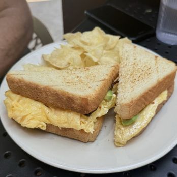 La Reunion - Breakfast sandwich - Bars Near Me - Dallas, Texas