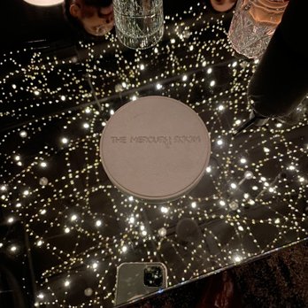 The Mercury Room - The reflection of the ceiling lights. - Cocktail Bars Near Me - Kansas City, Missouri