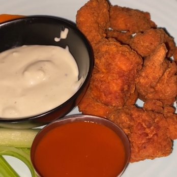 Hide Rooftop - Boneless Buffalo Chicken w/extra buffalo sauce and blue cheese dressing - Lounges Near Me - New York, New York Hide Rooftop - Boneless Buffalo Chicken w/extra buffalo sauce and blue cheese dressing - Lounges Near Me - New York, New York