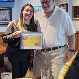 Recognition certificate presented to Kayla.