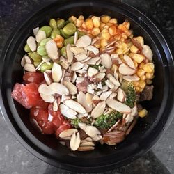 bowls and rolls - Brown rice, sirloin, ahi tuna, edamame, sweet corn, broccoli, sliced almonds, and honey Sriracha $11.75 (3.22.2025)