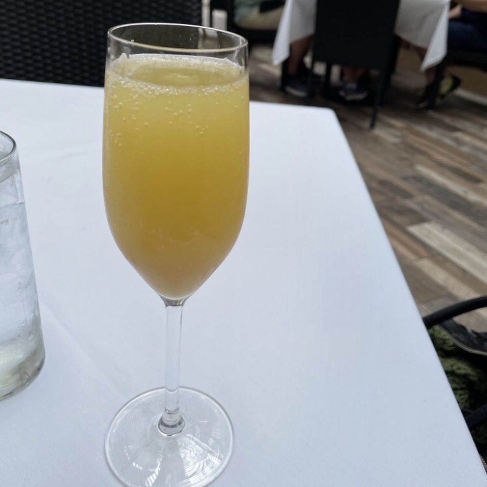 Carmine's - Sparkling Mimosa - Italian Near Me - Chicago, Illinois Carmine's - Sparkling Mimosa - Italian Near Me - Chicago, Illinois