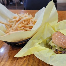 1/4 size French fries and a cheeseburger