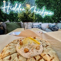 The Hidden Chickpea - House made hummus served with pita