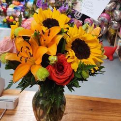 Como La Flor Flowers & Balloons