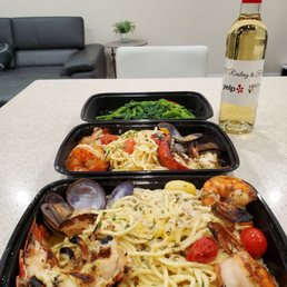 Seafood spaghettini  and a side of rapini